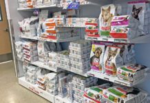 Low protein dog food is one of many prescription foods for pets pictured here in a display.