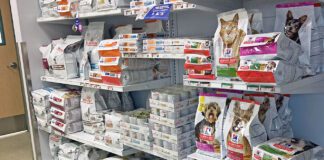 Low protein dog food is one of many prescription foods for pets pictured here in a display.