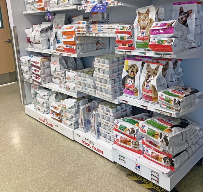 Low protein dog food is one of many prescription foods for pets pictured here in a display.