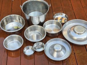 A selection of stainless steel dog food bowls.