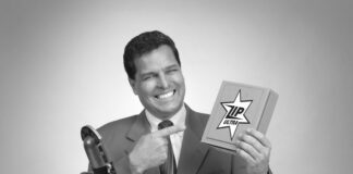 An old fashioned TV pitch man tries to sell a box of something.